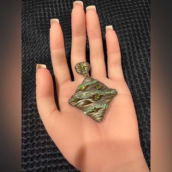 Wavy Textured Gold-Tone Pendant with
Sparkling Green Gems - Picture 9 of 9